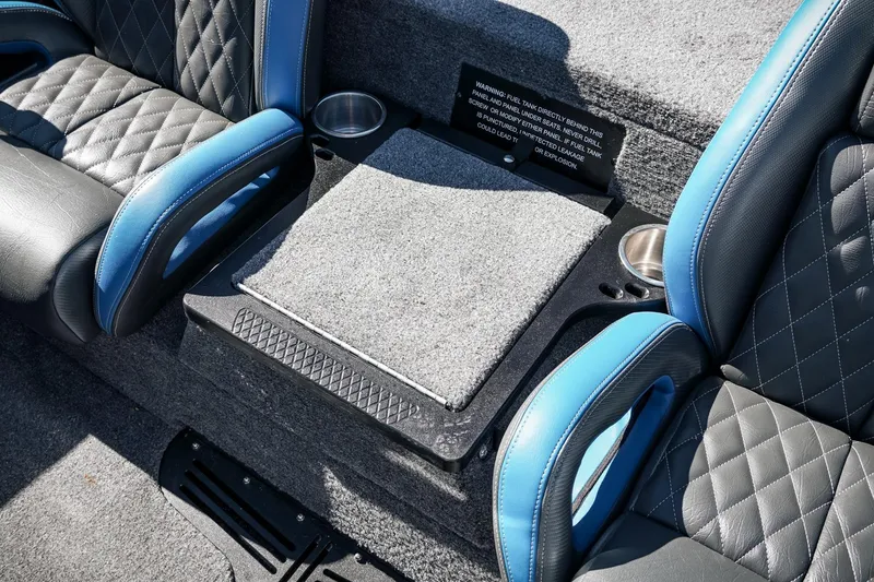 Slide: The Image of 2026 Phoenix 721 ZXL boat interior with quilted seats and cup holders. - 17