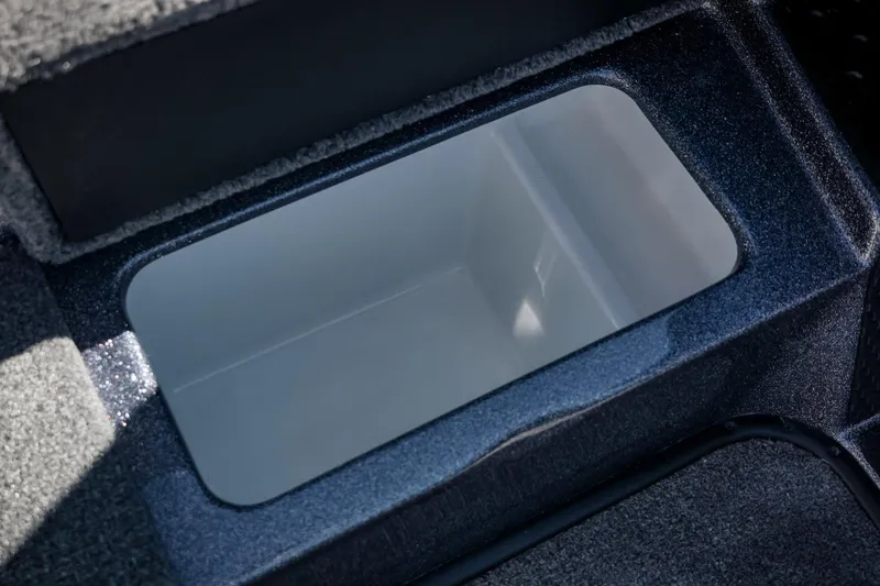 Slide: The Image of Storage compartment in 2026 Phoenix 721 ZXL boat, featuring sleek design and spacious interior. - 21