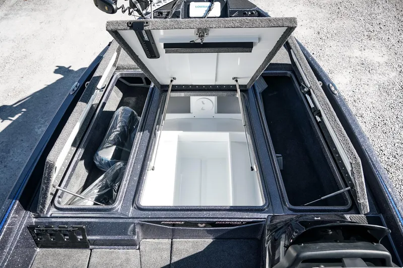 Slide: The Image of 2026 Phoenix 721 ZXL boat interior with open storage compartments and modern equipment. - 22