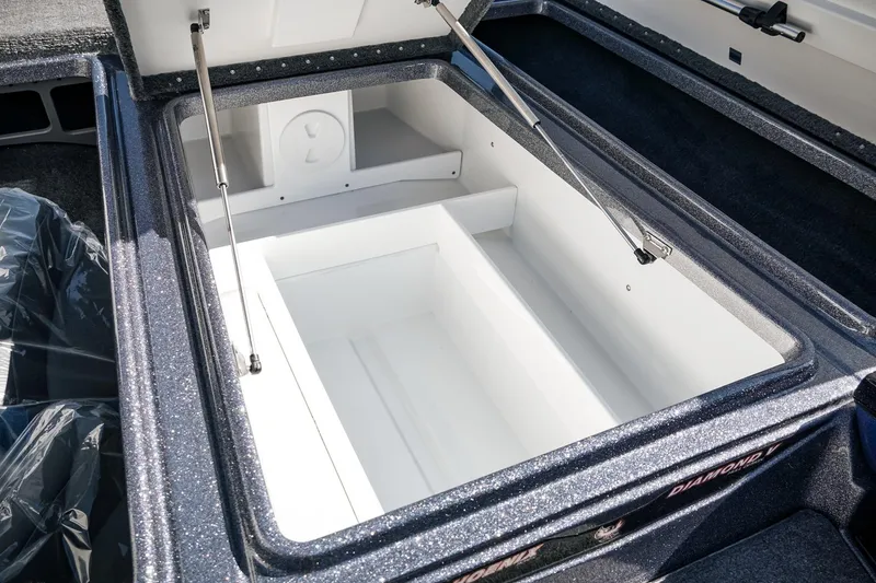 Slide: The Image of Open storage compartment in 2026 Phoenix 721 ZXL boat, showcasing spacious interior design. - 23
