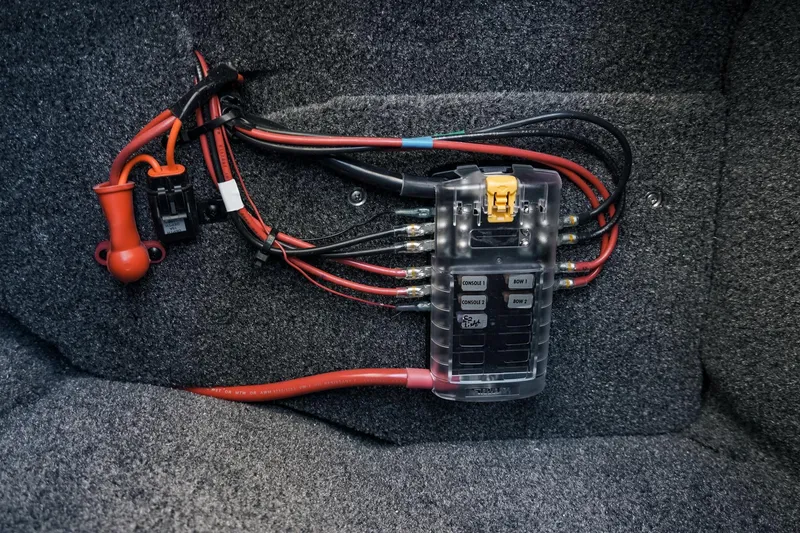Slide: The Image of Electrical wiring and fuse box in 2026 Phoenix 721 ZXL boat interior. - 25