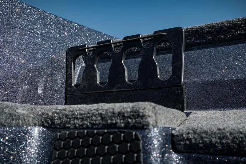 Slide: The Image of 2026 Phoenix 721 ZXL boat detail with glitter finish and rod holder. - 32
