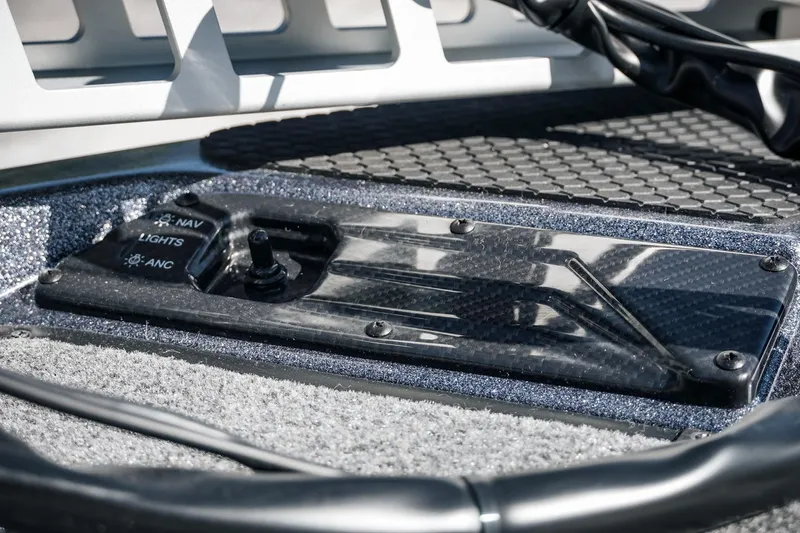 Slide: The Image of Control panel of 2026 Phoenix 721 ZXL boat with navigation and light switches. - 39