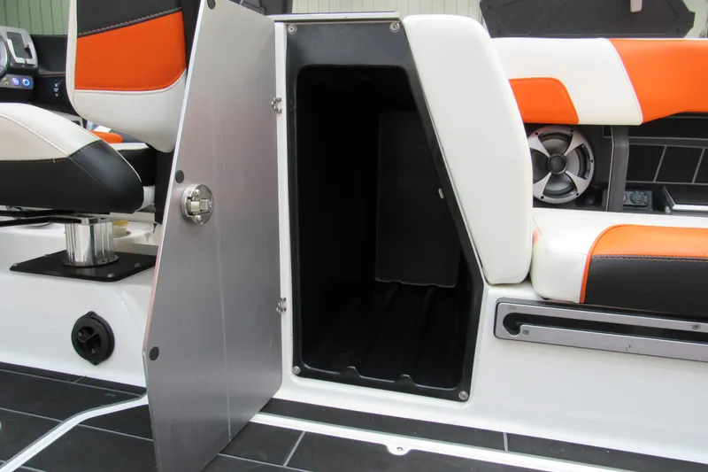 Slide: The Image of 2021 Malibu Wakesetter 24 MXZ interior storage compartment with stylish seating. - 8