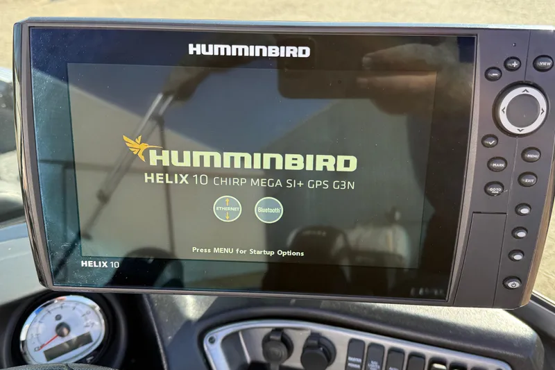 Slide: The Image of Humminbird Helix 10 fish finder on 2019 Lund 2025 Impact XS boat dashboard. - 23