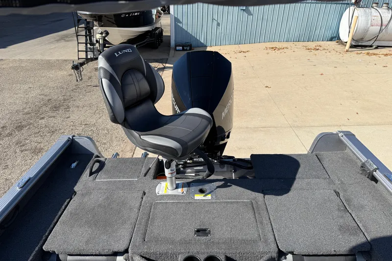 Slide: The Image of 2019 Lund 2025 Impact XS boat with Mercury engine and swivel seat. - 33