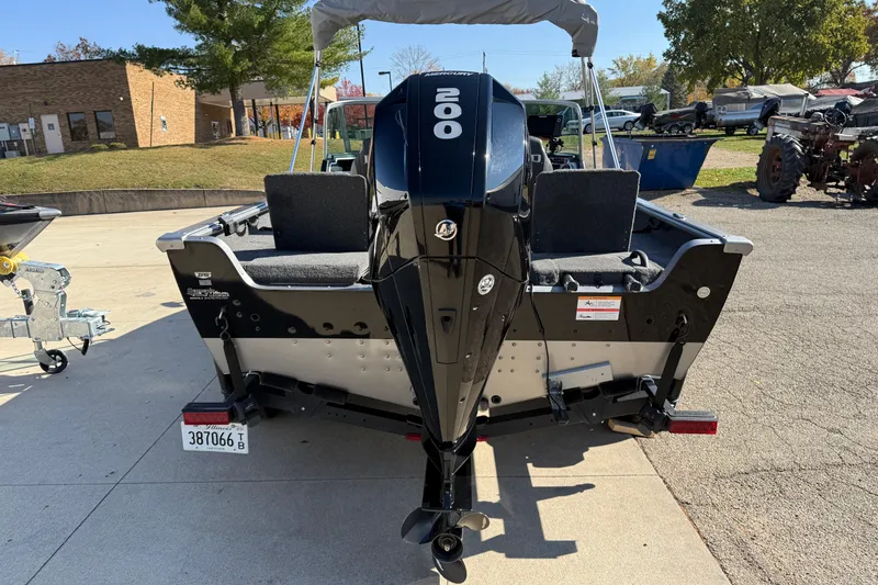 Slide: The Image of 2019 Lund 2025 Impact XS boat with powerful 200 HP outboard motor. - 5