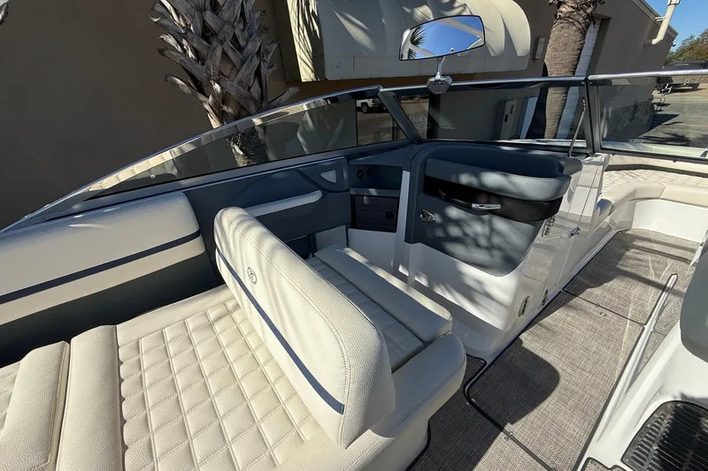 Slide: The Image of 2018 Cobalt R7 Surf boat interior with luxurious seating and modern design. - 7