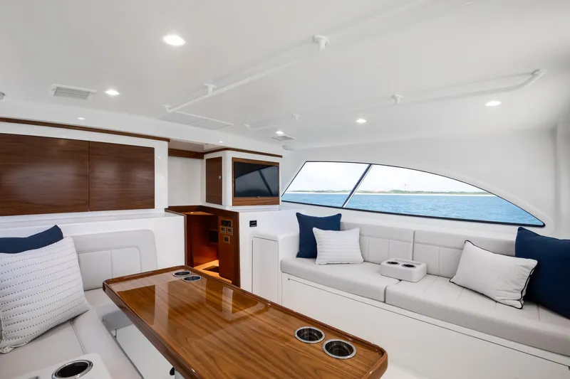 Slide: The Image of Luxurious interior of 2026 Viking 46 Billfish yacht with elegant seating and ocean view. - 10