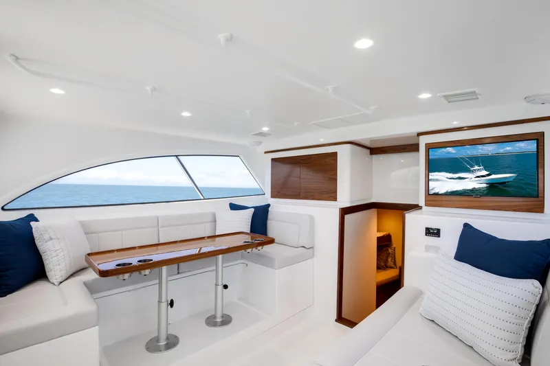 Slide: The Image of Luxurious interior of 2026 Viking 46 Billfish yacht with elegant seating and ocean view. - 11
