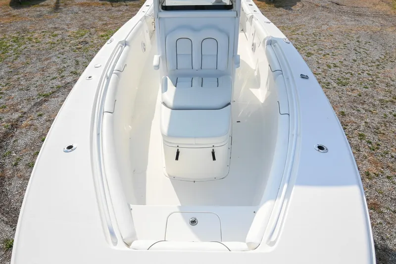 Slide: The Image of 2015 Sea Hunt Gamefish 30 boat interior with seating and storage compartments. - 31