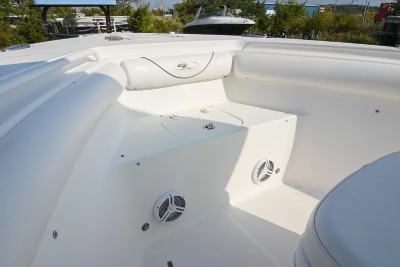 Slide: The Image of 2015 Sea Hunt Gamefish 30 boat interior with seating and speakers. - 34