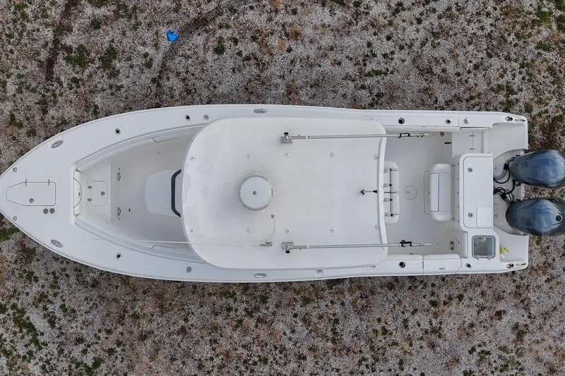 Slide: The Image of Aerial view of 2015 Sea Hunt Gamefish 30 boat on gravel surface. - 40