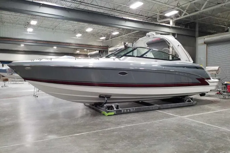 The Image of 2019 Formula 330 Crossover Bowrider in a showroom, showcasing sleek design and modern features. - 0