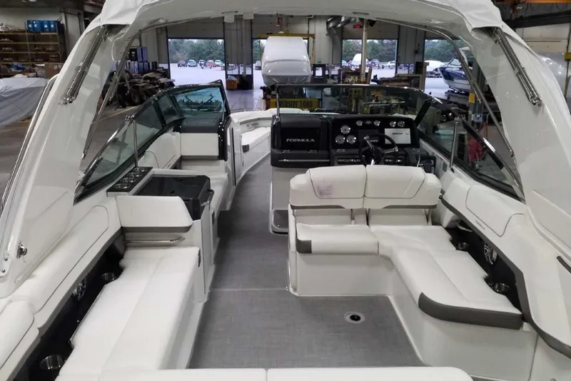 Slide: The Image of 2019 Formula 330 Crossover Bowrider swim platform detail, showcasing stainless steel components. - 11