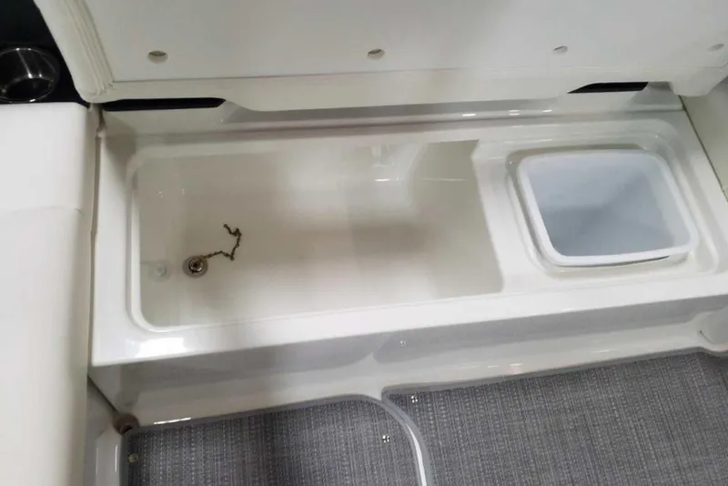 Slide: The Image of Engine compartment of a 2019 Formula 330 Crossover Bowrider with twin 6.2L engines. - 19