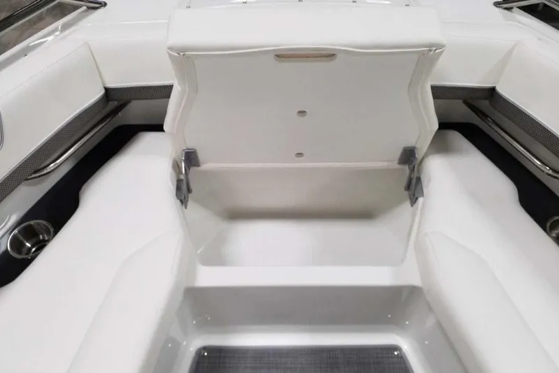 Slide: The Image of Storage compartment in a 2019 Formula 330 Crossover Bowrider with life jacket and equipment. - 30