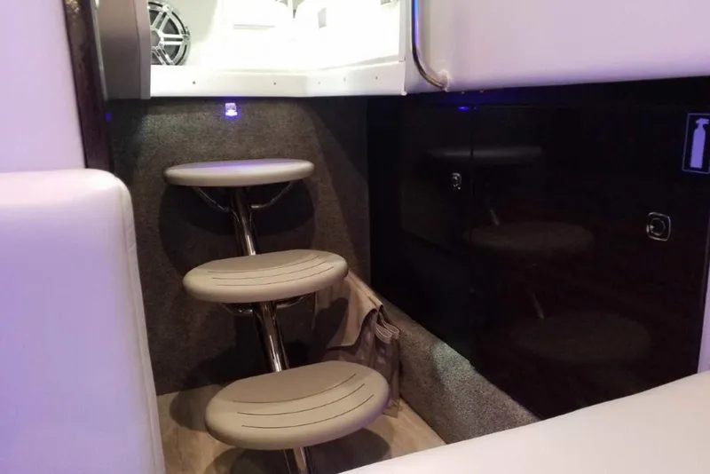 Slide: The Image of 2019 Formula 330 Crossover Bowrider cockpit with modern controls and comfortable seating. - 34