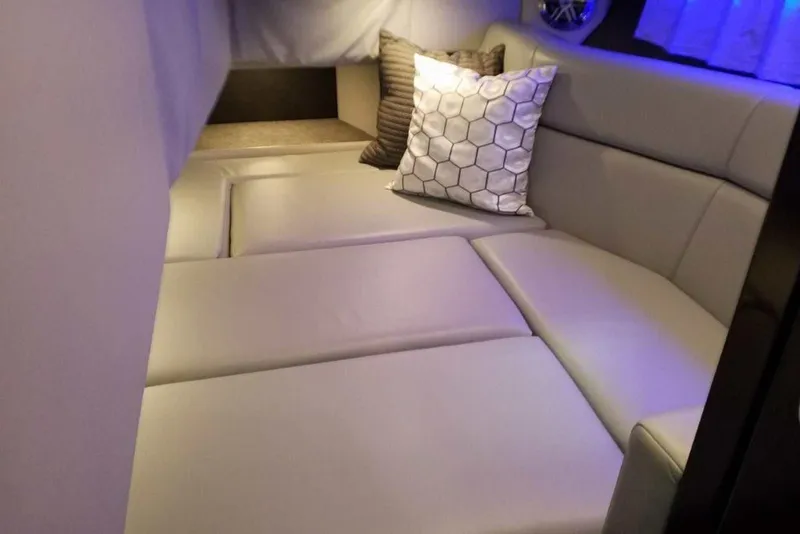 Slide: The Image of 2019 Formula 330 Crossover Bowrider cockpit with modern controls and comfortable seating. - 35