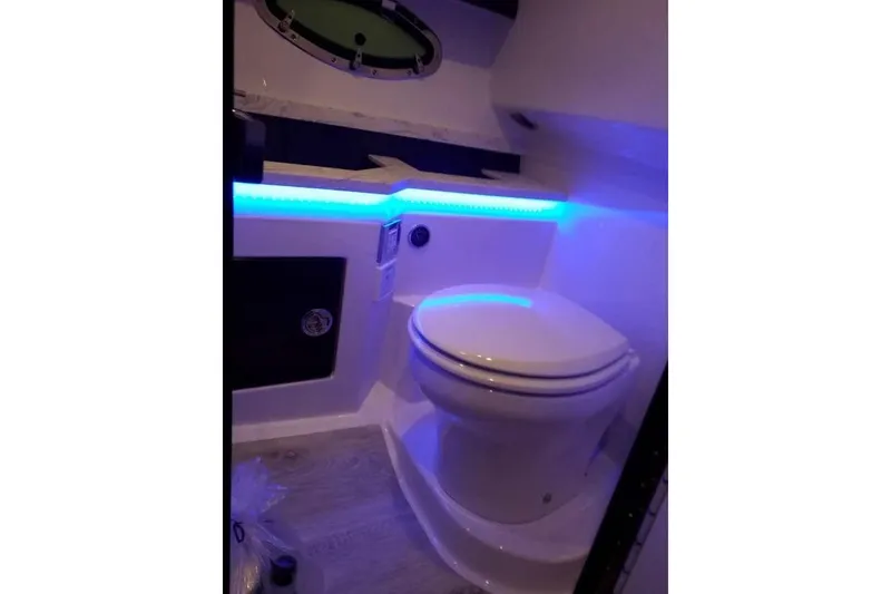 Slide: The Image of 2019 Formula 330 Crossover Bowrider interior with sleek seating and modern design. - 38