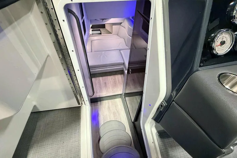 Slide: The Image of 2019 Formula 330 Crossover Bowrider cabin interior with modern seating and sleek design. - 53