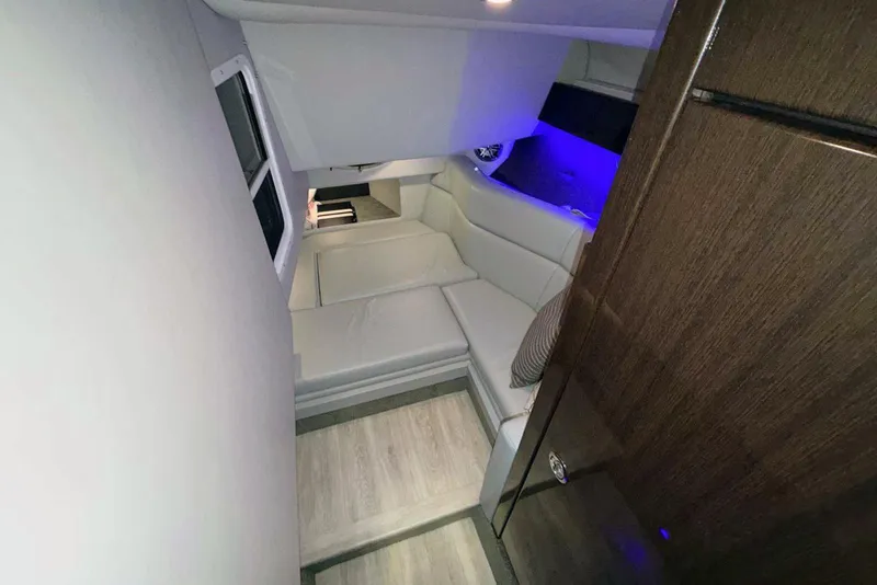 Slide: The Image of Interior of 2019 Formula 330 Crossover Bowrider with modern seating and ambient lighting. - 54