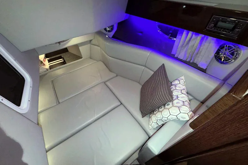 Slide: The Image of Luxurious interior of 2019 Formula 330 Crossover Bowrider with plush seating and ambient lighting. - 55