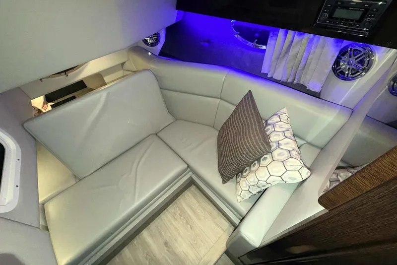 Slide: The Image of 2019 Formula 330 Crossover Bowrider interior with modern seating and ambient lighting. - 56