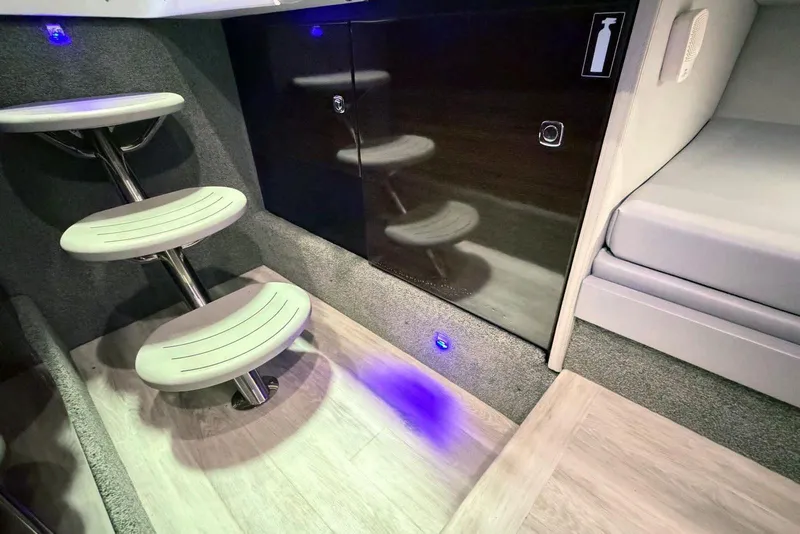 Slide: The Image of Interior of 2019 Formula 330 Crossover Bowrider with modern steps and seating. - 59