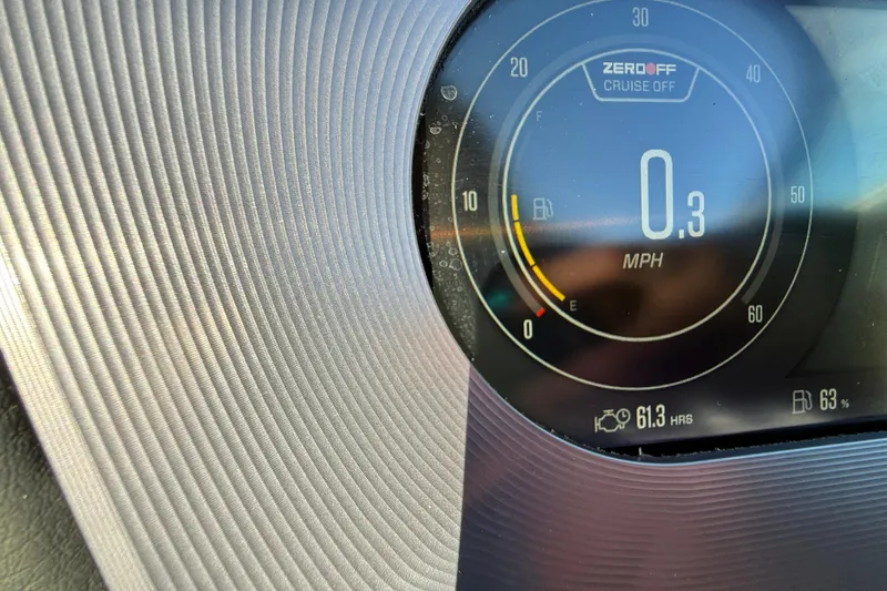 Slide: The Image of Dashboard of 2023 MasterCraft XT23 showing speedometer and fuel gauge. - 12