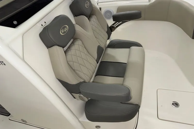 Slide: The Image of 2025 Key West 263 FS boat seating with gray and beige upholstery. - 10