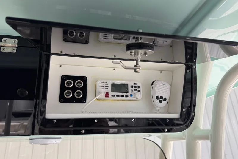 Slide: The Image of 2025 Key West 263 FS boat console with radio and control panel. - 25