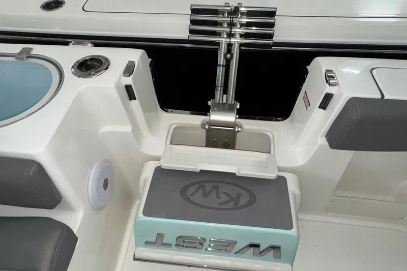 Slide: The Image of 2025 Key West 263 FS boat interior with seating and storage features. - 24
