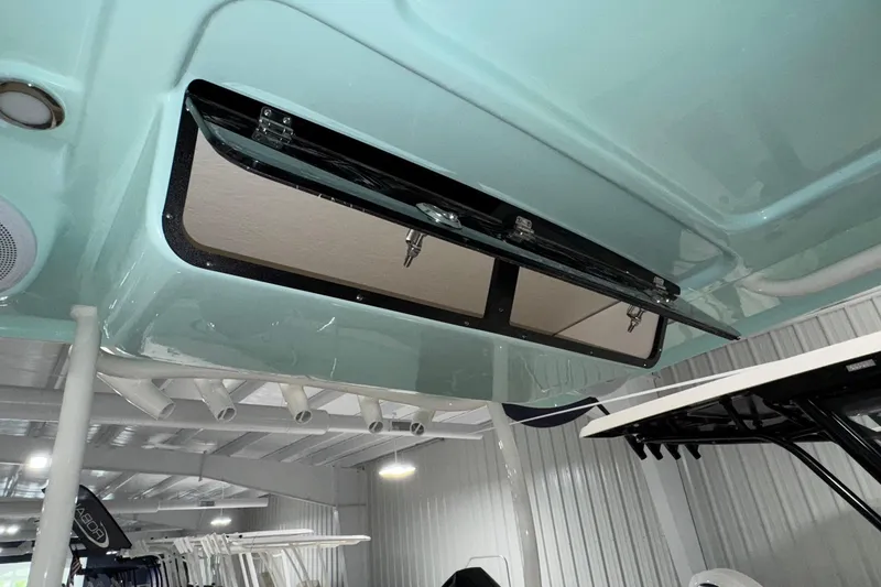 Slide: The Image of Open storage compartment on 2025 Key West 263 FS boat, showcasing interior details. - 16