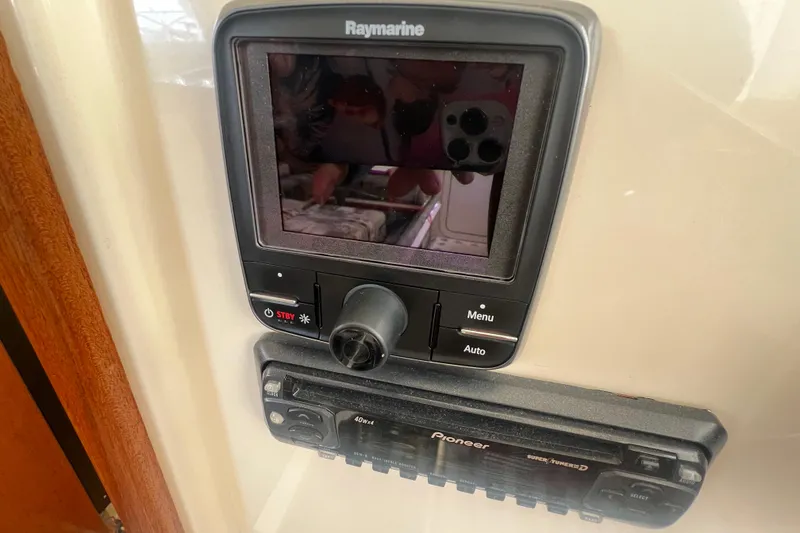 Slide: The Image of Raymarine navigation system and Pioneer stereo on 2005 Camano Trawler. - 30