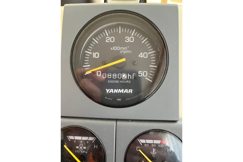 Slide: The Image of Yanmar engine hour meter on 2005 Camano Trawler, displaying 8802 hours. - 42