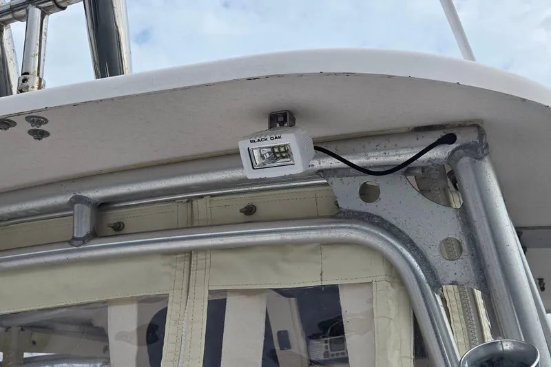 Slide: The Image of 2003 Grady-White Voyager 258 boat with mounted Black Oak LED light. - 10