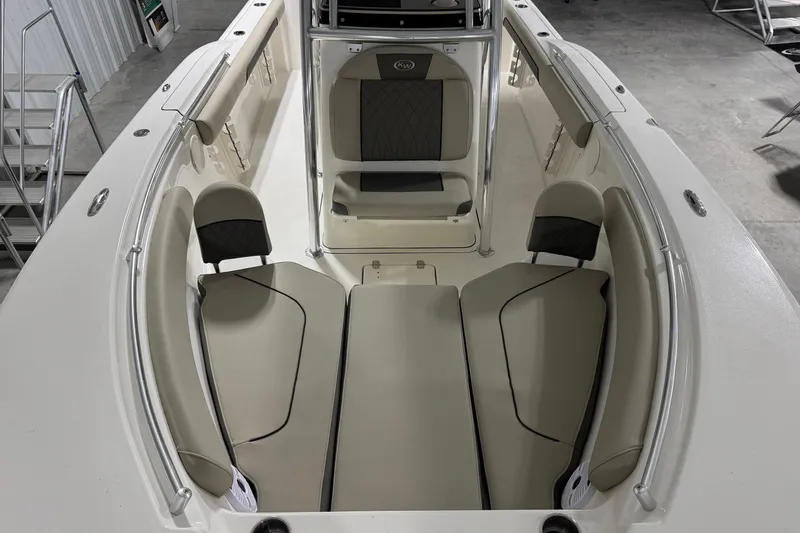 Slide: The Image of 2026 Key West 244 Center Console boat interior with cushioned seating and sleek design. - 6