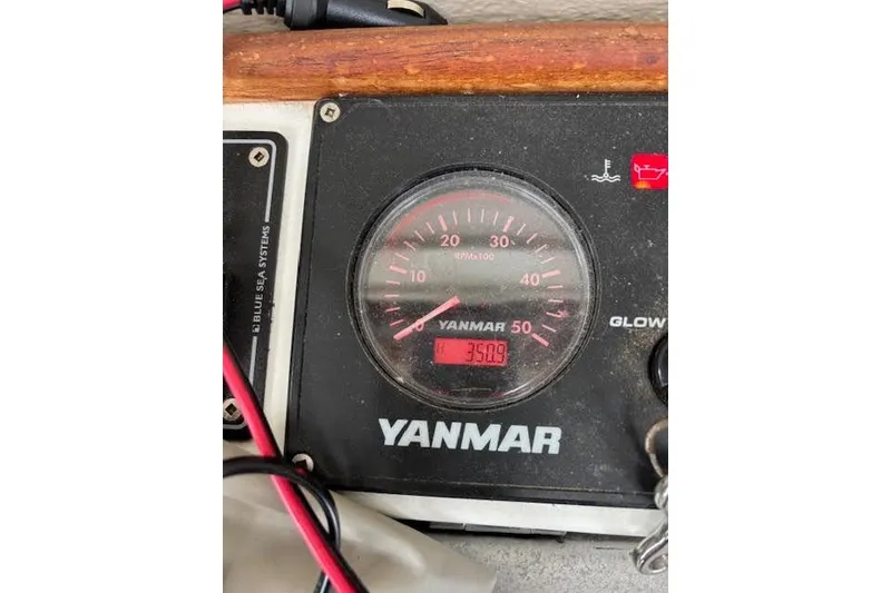 Slide: The Image of Yanmar engine gauge on 2009 Ranger Tugs R21-EC, displaying 3509 hours. - 26