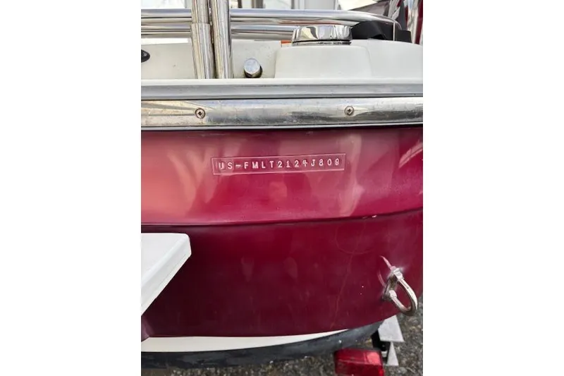 Slide: The Image of 2009 Ranger Tugs R21-EC boat with visible hull identification number. - 6