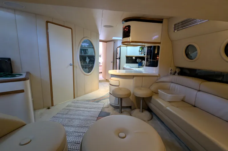 Slide: The Image of Luxurious interior of a 1994 Sea Ray 500 Sundancer yacht with modern amenities. - 25