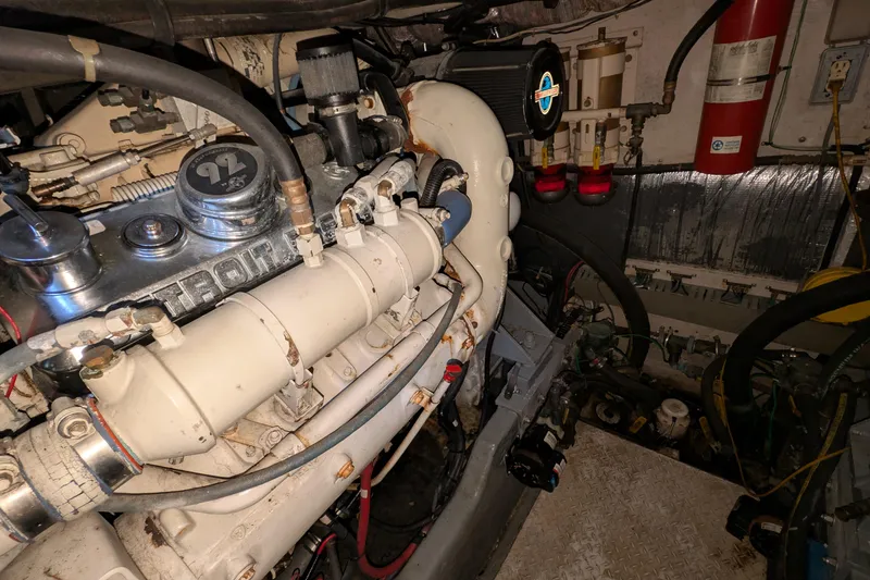 Slide: The Image of Engine room of a 1994 Sea Ray 500 Sundancer with Detroit Diesel engine. - 49