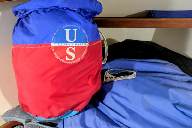 Slide: The Image of Red and blue Ullman Sails bag on Catalina Capri 26 sailboat, 1990 model. - 18