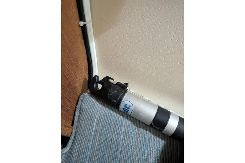 Slide: The Image of Interior detail of a 1990 Catalina Capri 26 sailboat, featuring a Spinnaker pole - 21