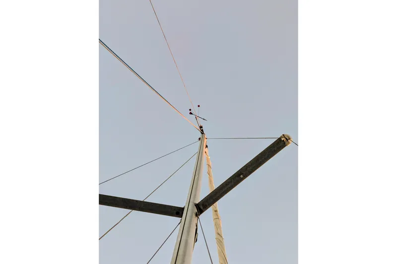 Slide: The Image of Looking up at the mast of a 1990 Catalina Capri 26 sailboat. - 31