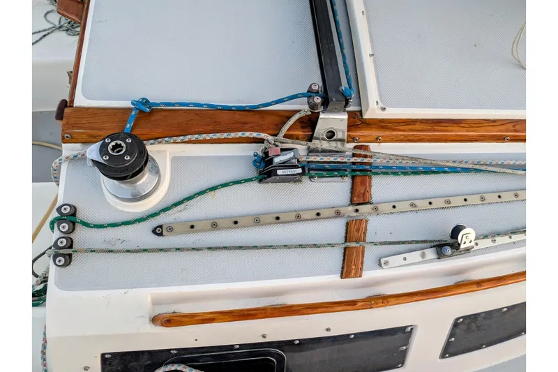 Slide: The Image of Deck of 1990 Catalina Capri 26 sailboat with winch and rigging details. - 33