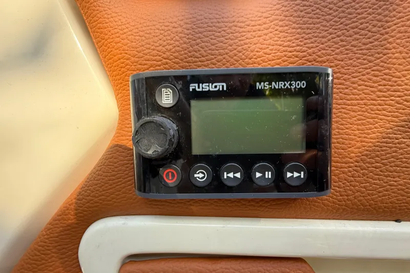 Slide: The Image of Fusion MS-NRX300 stereo system on 2018 Chris-Craft Capri 27 boat dashboard. - 26