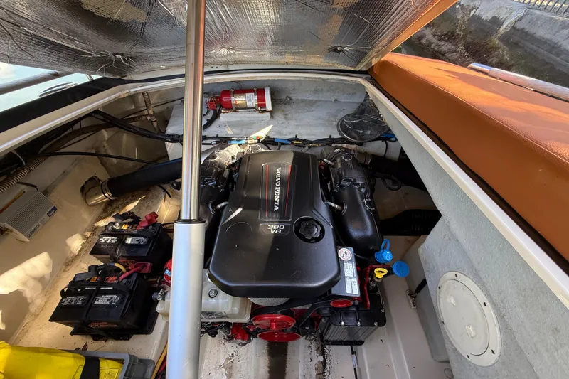 Slide: The Image of Engine compartment of a 2018 Chris-Craft Capri 27 boat with Volvo Penta V8 engine. - 63