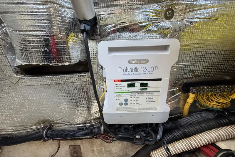 Slide: The Image of ProNautic 12:30P charger in 2018 Chris-Craft Capri 27 boat engine compartment. - 66