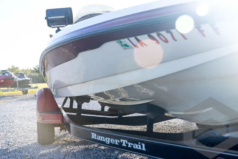 Slide: The Image of 2002 Ranger 185 VS boat on trailer with sunlight glare. - 10